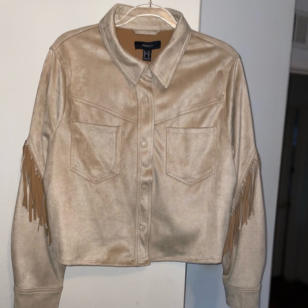 New with tags, light-weight jacket with fringe on sleeves